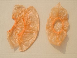 Изображение товара «Бахилы одноразовые  ПРОЧНЫЕ  35мкм (400х140мм) оранжевые пара уп. N1000»